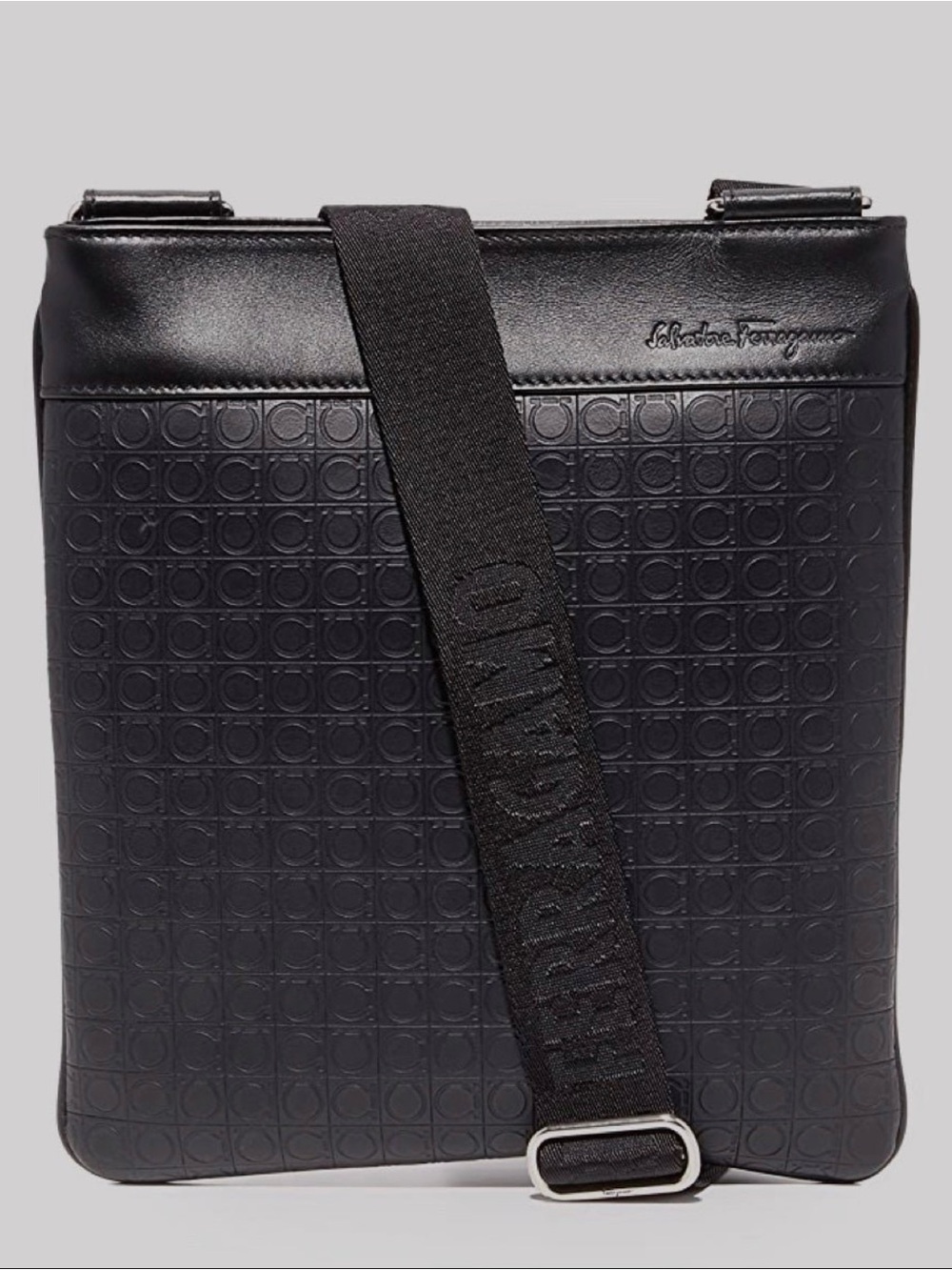 $1200.Salvatore Ferragamo UNISEX signature leather cross body.Never Carried MINT